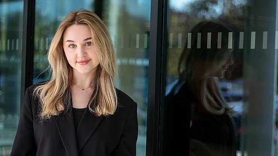 Portrait of Yelisaveta, reflected in the window pane of a scientific institute