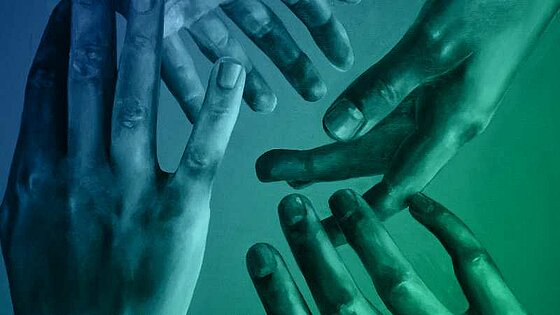 Equity and Diversity Four hands touching each other lightly